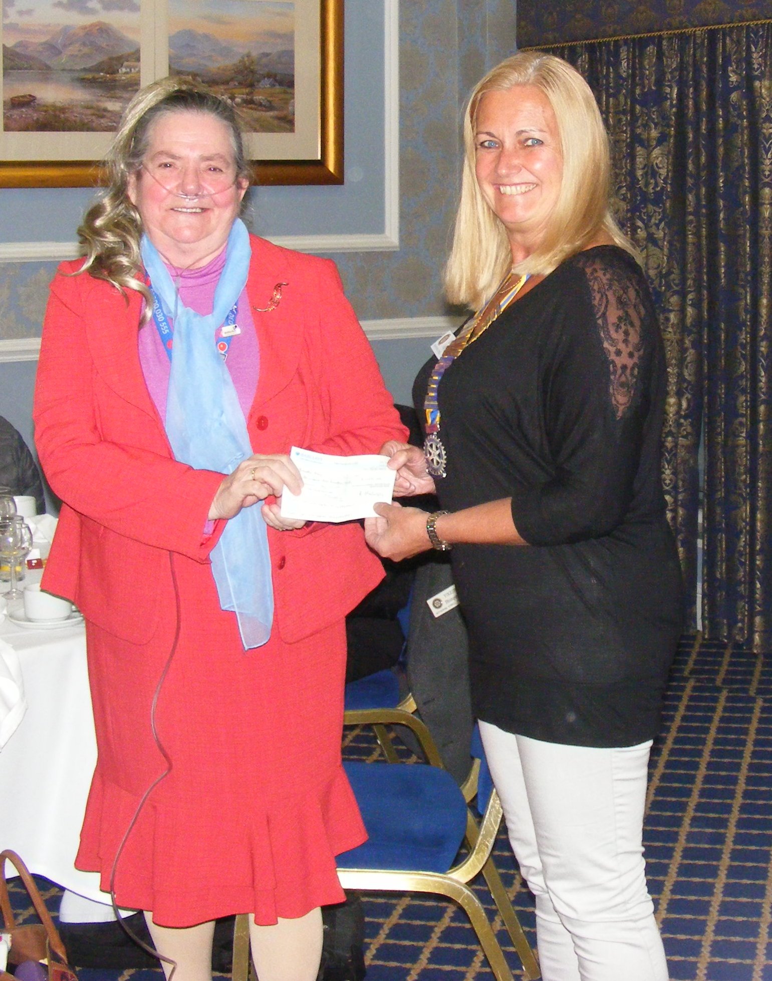 President Ann presents a cheque to Wilma Abbott