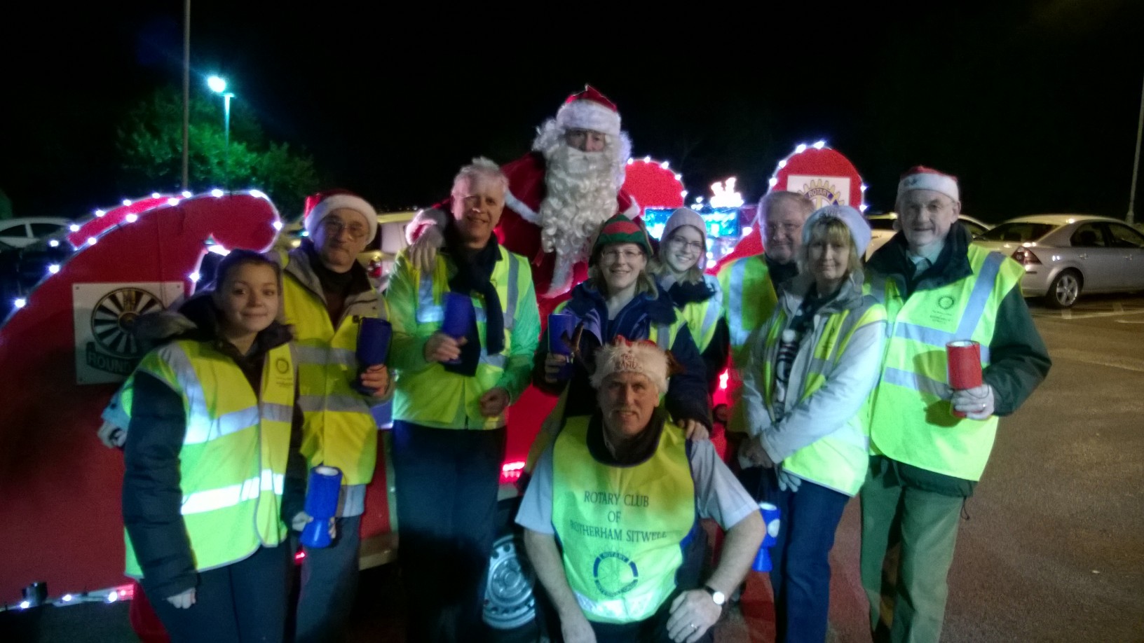 Santa with his other helpers